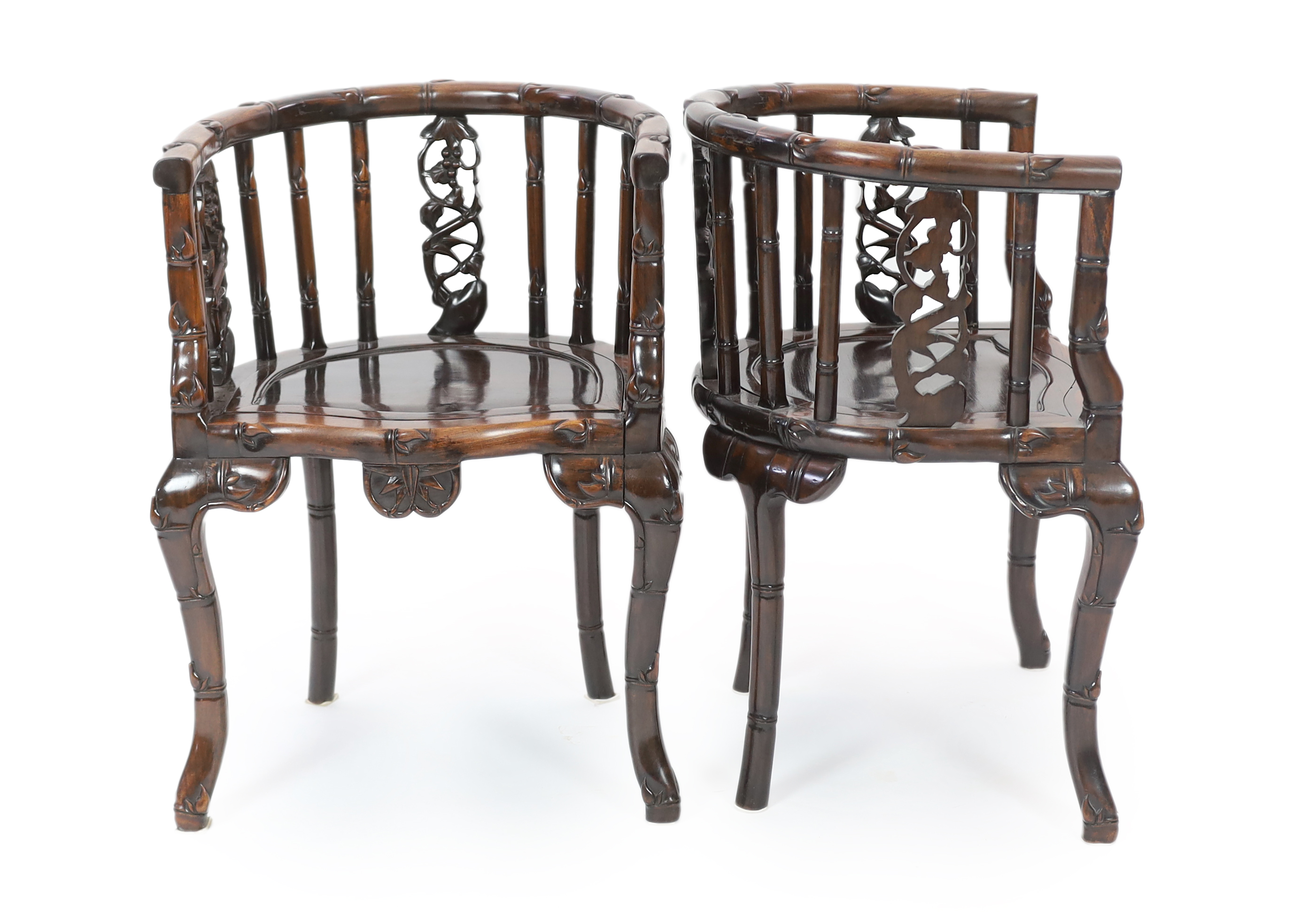 A pair of Chinese hongmu tub-shaped armchairs, late 19th century